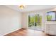 Bright dining area leading to deck, featuring hardwood floors and deck access at 1162 Westover Cir, Rock Hill, SC 29732