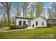 Charming white brick home with a well-manicured lawn and lush landscaping at 1162 Westover Cir, Rock Hill, SC 29732