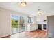 Bright, modern kitchen featuring deck access, stainless steel appliances, and deck access at 1162 Westover Cir, Rock Hill, SC 29732