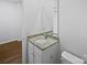 Bright bathroom featuring a granite countertop vanity with white cabinets and a large mirror at 1235 Culver Spring Way, Charlotte, NC 28215