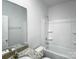 Clean and bright bathroom featuring a granite vanity, tub, and modern fixtures at 1235 Culver Spring Way, Charlotte, NC 28215