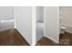 Hallway between rooms featuring hardwood style flooring at 1235 Culver Spring Way, Charlotte, NC 28215