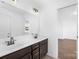 Bathroom showcasing double sinks, modern fixtures, and an open-concept design at 12437 Walker Dr # 89, Stanfield, NC 28163