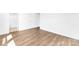 Neutral bathroom with wood-look floors, shower and bathtub combo, and modern features at 12437 Walker Dr # 89, Stanfield, NC 28163