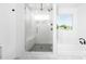 Modern bathroom featuring a glass-enclosed shower and separate soaking tub for relaxation at 12437 Walker Dr # 89, Stanfield, NC 28163