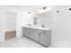 Bathroom featuring double sinks, vanity, and modern fixtures with an open design at 12437 Walker Dr # 89, Stanfield, NC 28163