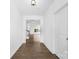 Entryway showing the hardwood floors leading into the rest of the home at 12437 Walker Dr # 89, Stanfield, NC 28163
