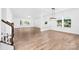 Bright living room with hardwood floors, large windows, recessed lighting, and an open concept layout at 12437 Walker Dr # 89, Stanfield, NC 28163