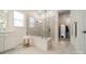 Bathroom highlighting a glass-enclosed shower, white cabinets, and sleek fixtures at 1402 Encore Ln, Waxhaw, NC 28173