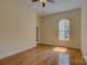 A spacious bedroom with hardwood floors, a vaulted ceiling, and natural light at 14103 Grand Traverse Dr, Charlotte, NC 28278