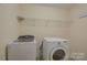 Bright laundry room with a modern washer and dryer at 14103 Grand Traverse Dr, Charlotte, NC 28278