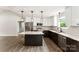 Modern kitchen featuring stainless steel appliances, a kitchen island, and stylish pendant lighting at 1451 Cherryville Rd, Shelby, NC 28150