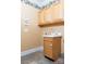 This laundry room features tile floor, built in cabinets, sink and faucet at 19113 Southport Dr, Cornelius, NC 28031