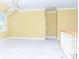 Upper level with carpet, one window, neutral paint, and white railing at 19113 Southport Dr, Cornelius, NC 28031