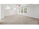 Large bedroom with vaulted ceilings, recessed lighting, ceiling fan, and natural light from windows at 206 Coburn Ct, Fort Mill, SC 29715