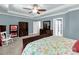 Open main bedroom with sitting area, spacious walk in closets, and serene color scheme at 206 Coburn Ct, Fort Mill, SC 29715