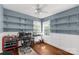 Office space with custom shelving, neutral walls, and a window for natural light at 206 Coburn Ct, Fort Mill, SC 29715