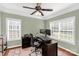 This well-lit office space has neutral walls, two windows, and a dark wood desk at 206 Coburn Ct, Fort Mill, SC 29715