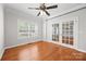 Study featuring hardwood floors, bright window, and double French doors at 206 Coburn Ct, Fort Mill, SC 29715