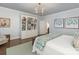 Bright bedroom with built-in bookcase and hardwood floors at 2219 Richardson Dr, Charlotte, NC 28211