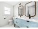 Beautiful bathroom features a double vanity, modern fixtures, and stylish tile work at 2230 W 6Th Ave, Gastonia, NC 28052