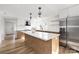 Modern kitchen features stainless steel appliances and a large center island at 2230 W 6Th Ave, Gastonia, NC 28052