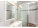 Modern bathroom with a glass-enclosed shower and updated vanity at 2404 Finchley Dr, Charlotte, NC 28215