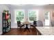 Bright dining area features a round table with seating and natural light from the window views at 2404 Finchley Dr, Charlotte, NC 28215