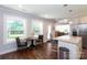 Bright dining area featuring a round table with seating and natural light from the windows at 2404 Finchley Dr, Charlotte, NC 28215