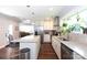 Bright kitchen with stainless steel appliances, granite countertops, and an island with bar stool seating at 2404 Finchley Dr, Charlotte, NC 28215