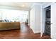 The home's living room offers great, open entertaining space and washer/dryer in the hall closet at 2404 Finchley Dr, Charlotte, NC 28215