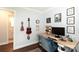 Bright office space featuring eclectic decor and functional desk area at 2404 Finchley Dr, Charlotte, NC 28215