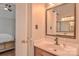 Bathroom with single sink, vanity, and mirror at 2731 Bishopton Pl, Charlotte, NC 28216