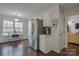 Kitchen with stainless steel appliances and white cabinets, lots of natural light at 2731 Bishopton Pl, Charlotte, NC 28216
