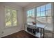 Eat-in kitchen area features bright windows and stainless steel appliances at 2731 Bishopton Pl, Charlotte, NC 28216