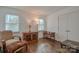 Cozy living room with hardwood floors and natural lighting at 2731 Bishopton Pl, Charlotte, NC 28216