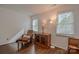 Inviting living room with hardwood floors and a cozy chair at 2731 Bishopton Pl, Charlotte, NC 28216