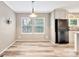Cozy dining area with large windows offering natural light and laminate flooring at 2749 Old Nation Rd, Fort Mill, SC 29715