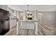 Updated kitchen featuring sleek appliances, an island, and updated tile backsplash at 2749 Old Nation Rd, Fort Mill, SC 29715