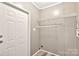 Practical laundry room with wire shelving and laminate flooring at 2749 Old Nation Rd, Fort Mill, SC 29715