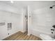 Bathroom area with shower-tub combo, modern fixtures, and clean finishes at 308 Birch St, Lowell, NC 28098