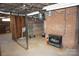Unfinished basement with brick walls and visible utilities, ready for customization at 311 33Rd Street Se Dr, Hickory, NC 28602