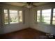 Bedroom with two windows providing natural light and outdoor views at 311 33Rd Street Se Dr, Hickory, NC 28602