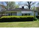 Charming single story home with a green lawn and tidy hedge in front at 311 33Rd Street Se Dr, Hickory, NC 28602