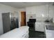 Functional kitchen with stainless steel refrigerator and ample counter space at 311 33Rd Street Se Dr, Hickory, NC 28602