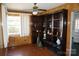 Cozy room showcases built-in shelving, windows, and hardwood flooring at 311 33Rd Street Se Dr, Hickory, NC 28602