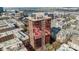 Stunning aerial view of the modern high-rise featuring reflective glass facade in an urban setting at 315 Arlington Ave # 705, Charlotte, NC 28203