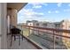 Relax on this balcony with seating and rail views of the city and railway at 315 Arlington Ave # 705, Charlotte, NC 28203