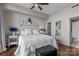 Inviting bedroom with a plush bed, soft lighting, and an en-suite bathroom at 315 Arlington Ave # 705, Charlotte, NC 28203