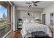 Relaxing bedroom features a large window with a view and comfortable furnishings at 315 Arlington Ave # 705, Charlotte, NC 28203